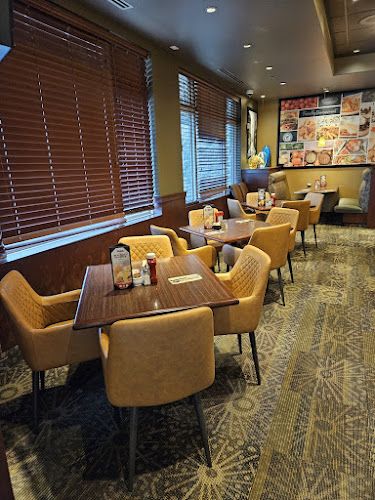 Ricky's All Day Grill - 170th Holiday Inn