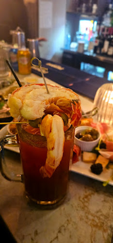 Perla Oyster Bar & Grill - Hospitality and gastronomy