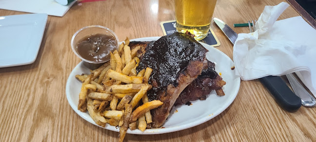 Opinii despre The Lion's Den Pub în Grande Prairie - Hospitality and gastronomy