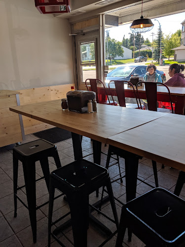 Carmine's Pizzeria- Authentic New York Style Pizzas - Calgary