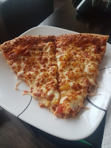 Comino's Pizza & Wings - Hospitality and gastronomy