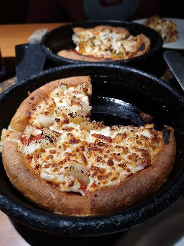 Pizza Hut - Hospitality and gastronomy