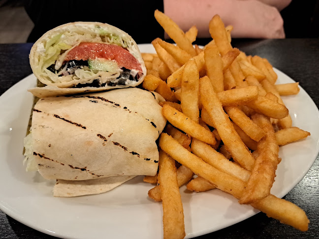 Opinii despre Quick Flame Restaurant and Bar în Oshawa - Hospitality and gastronomy