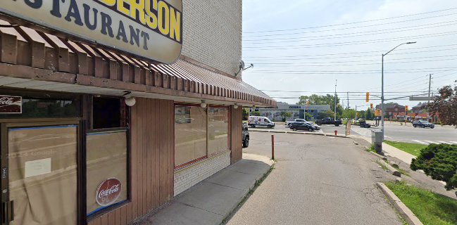 John Anderson Charcoal Broil Hamburgers